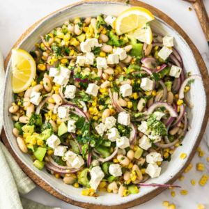 A bowl of charn corn and vegetables that is one of the best summer salad recipes