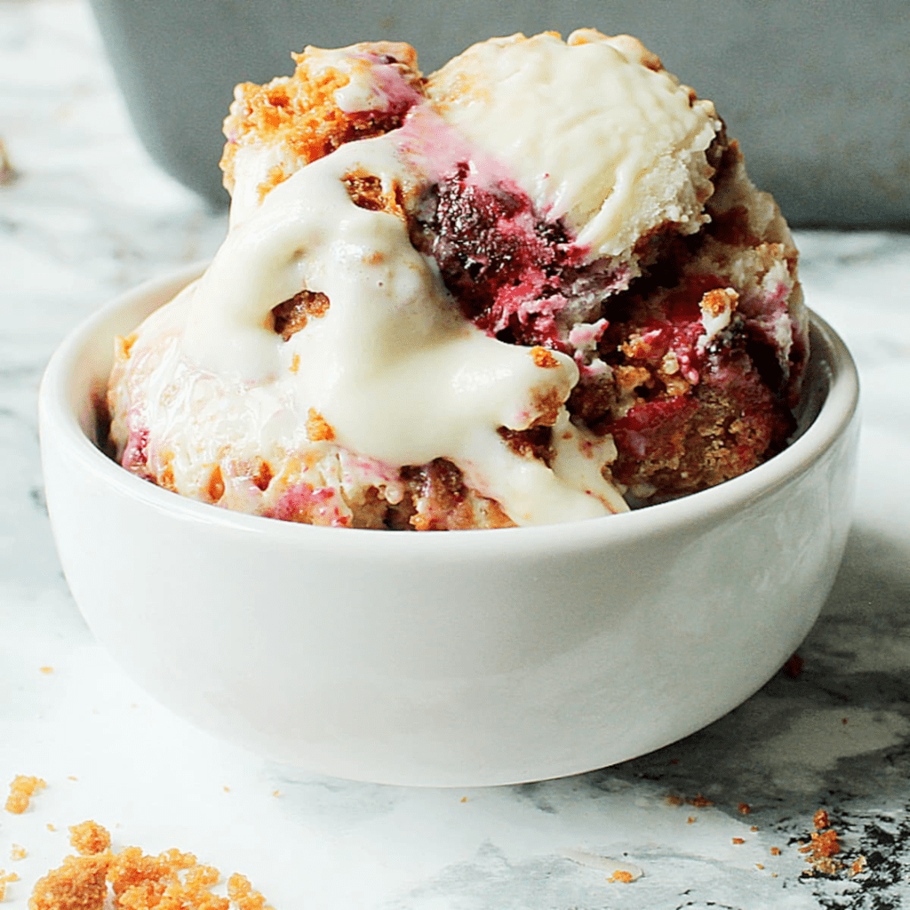 blackberry cheesecake ice cream in a bowl the best refreshing dessert for hot summer days