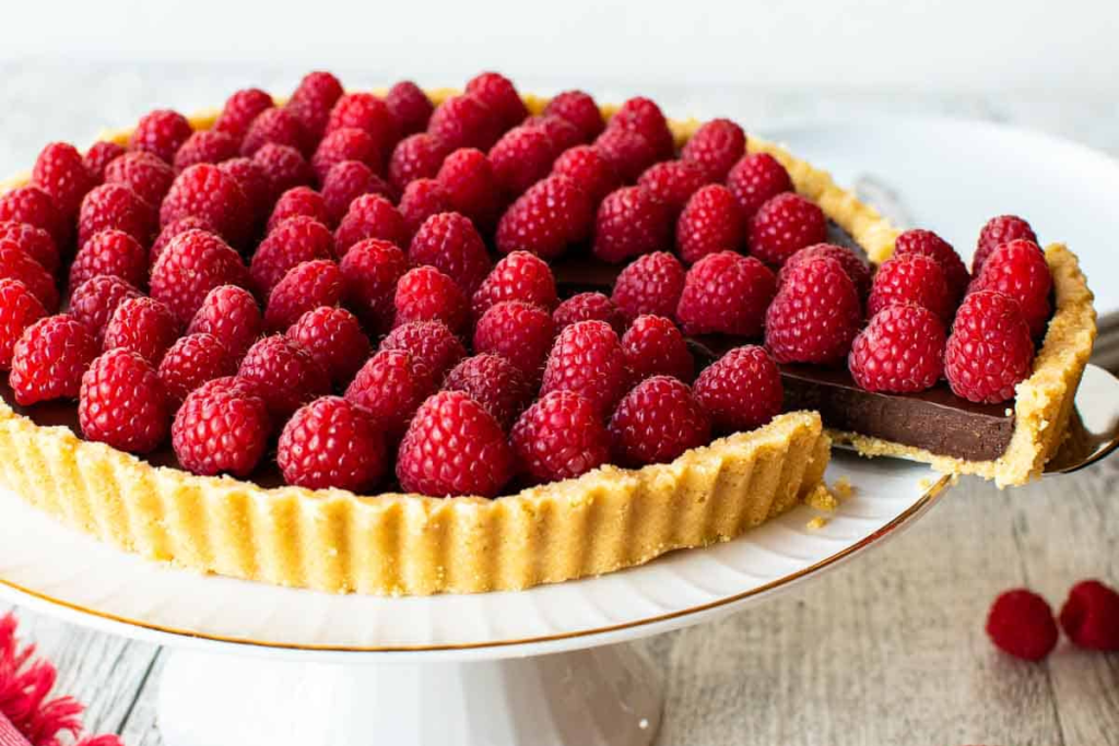 chocolate raspberry tart is the perfect bbq dessert for crowds